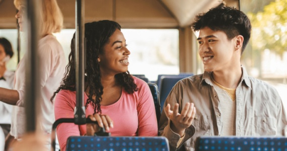 Happy travelers on a San Jose charter bus
